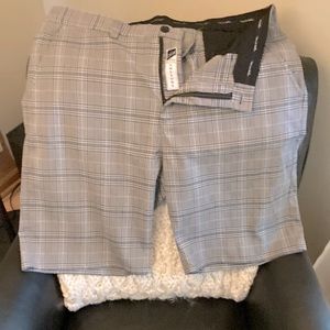 Nice Travis Mathew dress shorts. Size 38 but fit is more like 37